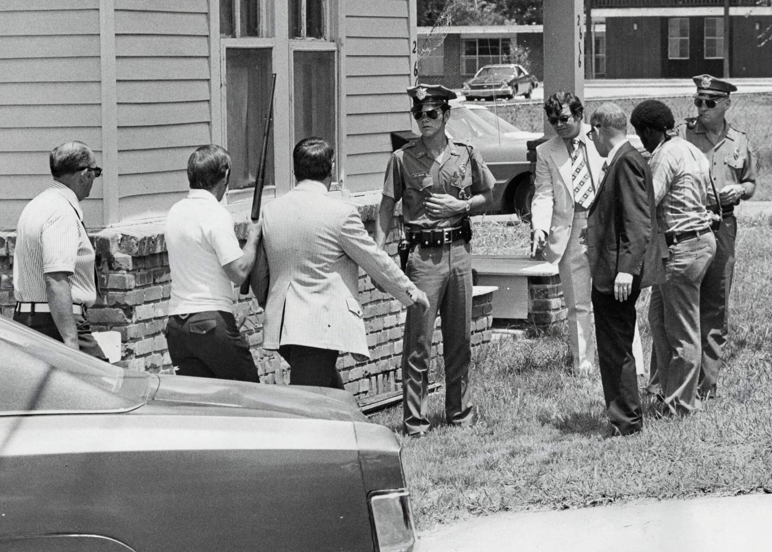 Local and federal agents arrive on the scene shortly after Milton Scott's death in Baton Rouge in 1973 Credit: Photo courtesy of The Advocate